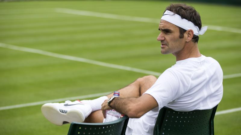 Federer y Djokovic avanzan en Wimbledon